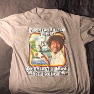 A Bob Ross Mistakes into Birds grey T shirt.